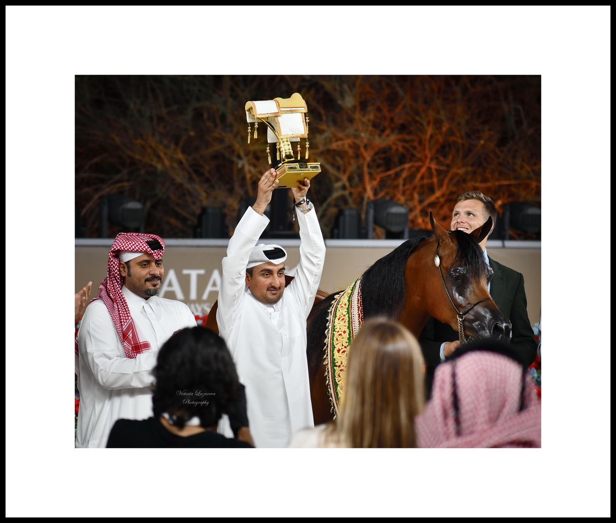 Al Shaqab stud manager Khalid Al Jehani, handler Arnauld Mertens & the winner junior Arabian filly Shahalel Al Shaqab, QATAR